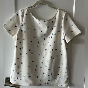 Cute White dress top with scoop neck line and tiny telephones